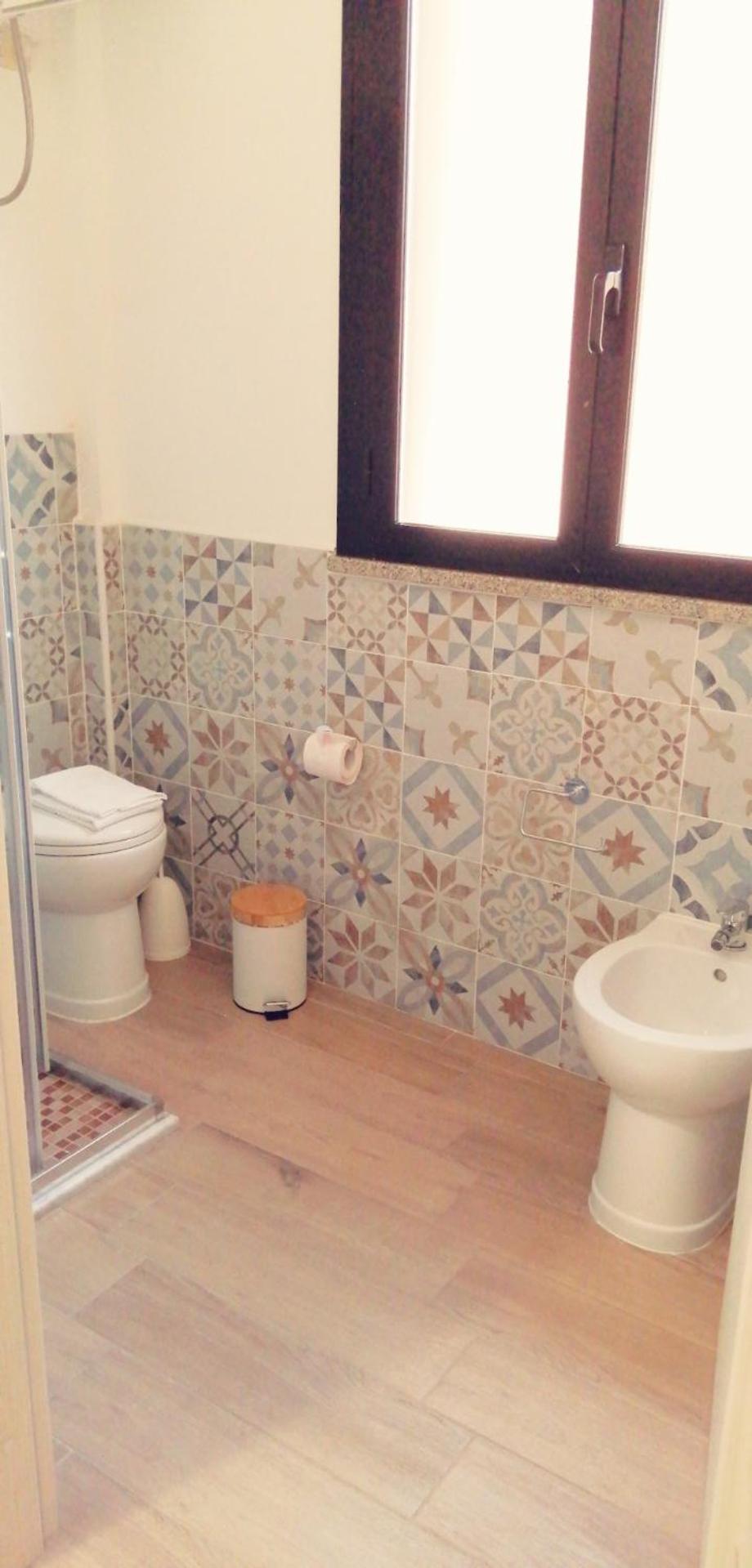Karaly - Posto Auto/moto Casa vacanze Cagliari